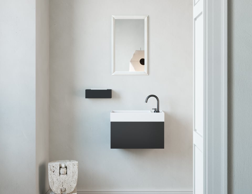 Resin washbasin in bathroom setting.