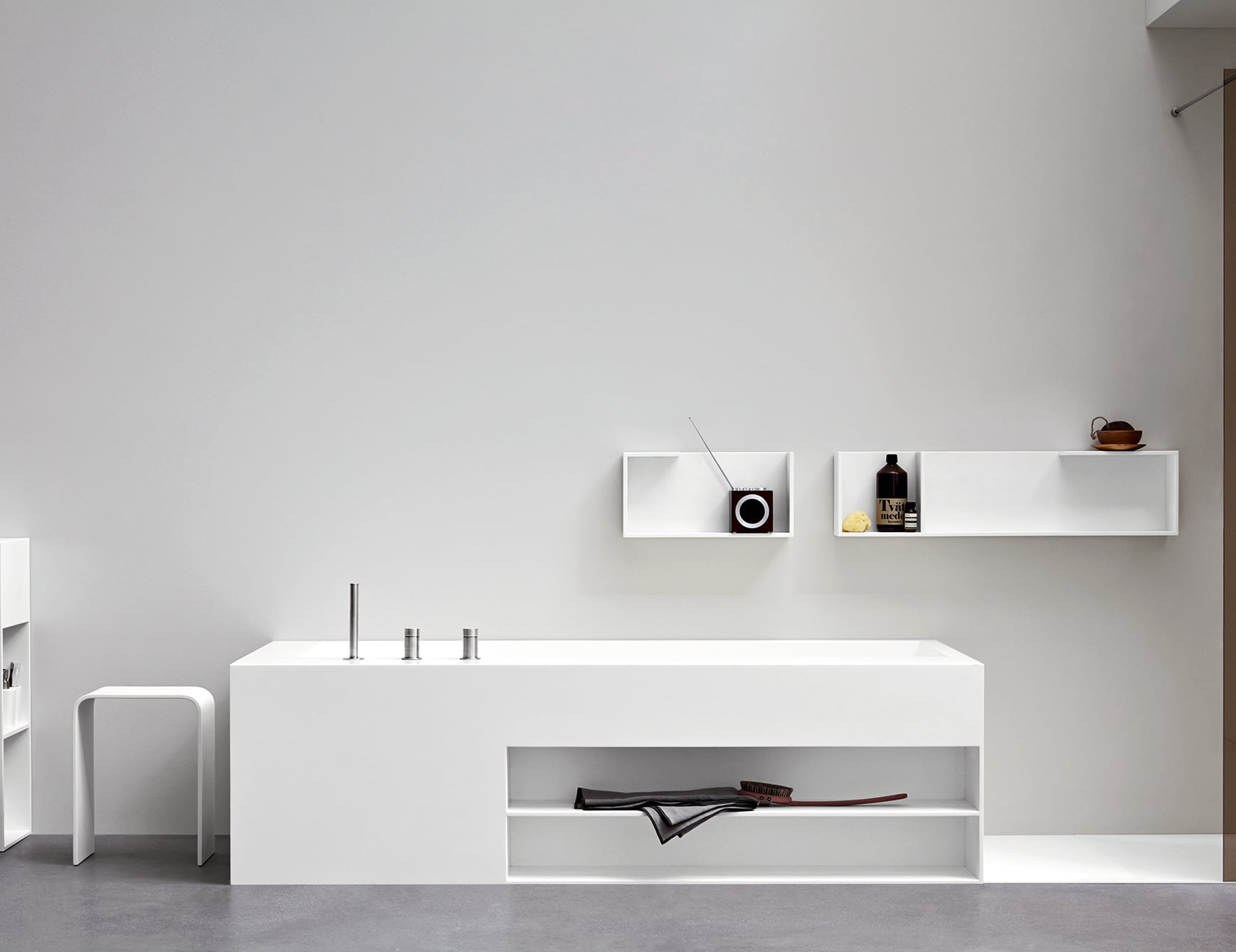 Resin bathtub in a bathroom setting.