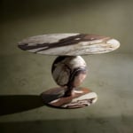 Round marble dining table with spherical base