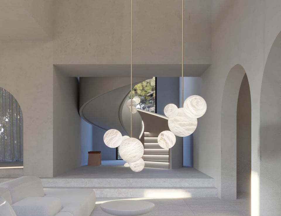 Alabaster pendant lights in a room with arches