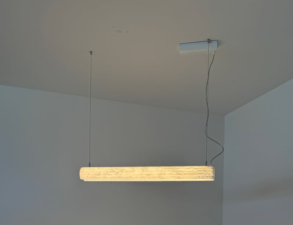 Alabaster wall light sconce in a room