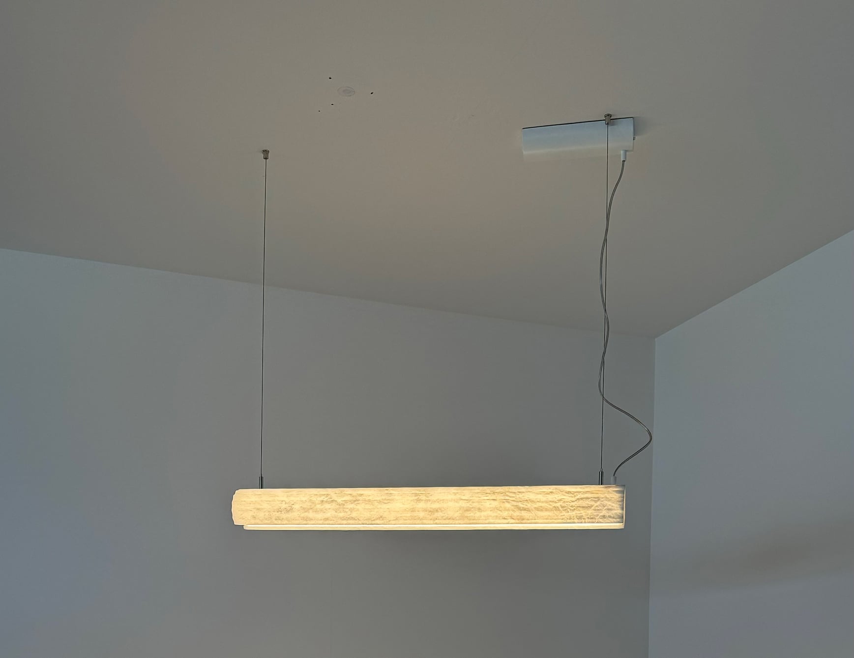 Alabaster wall light sconce in a room