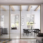 Glass and wood sliding door in room setting.