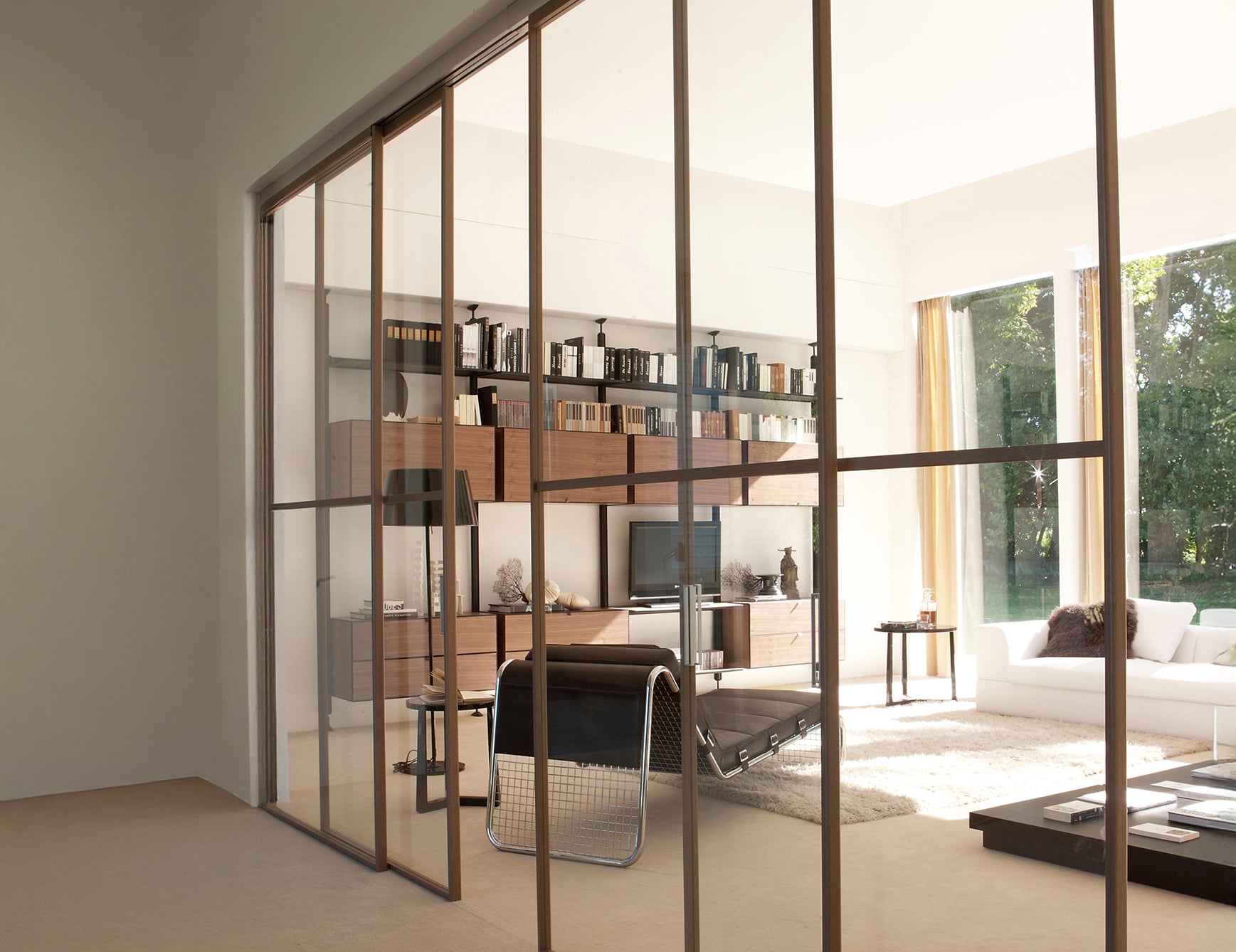 Glass and wood sliding door in a living room setting.