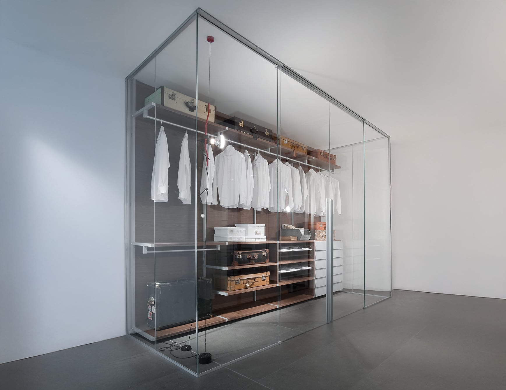 Glass and wood sliding door in closet setting.