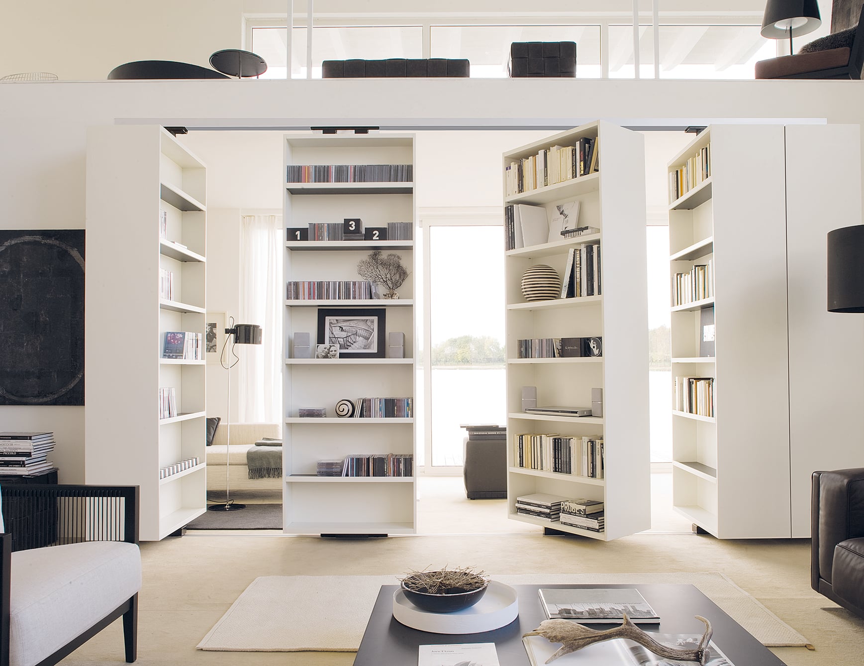 Modern living room with bookshelf divider