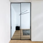 Modern glass sliding door in minimalist room