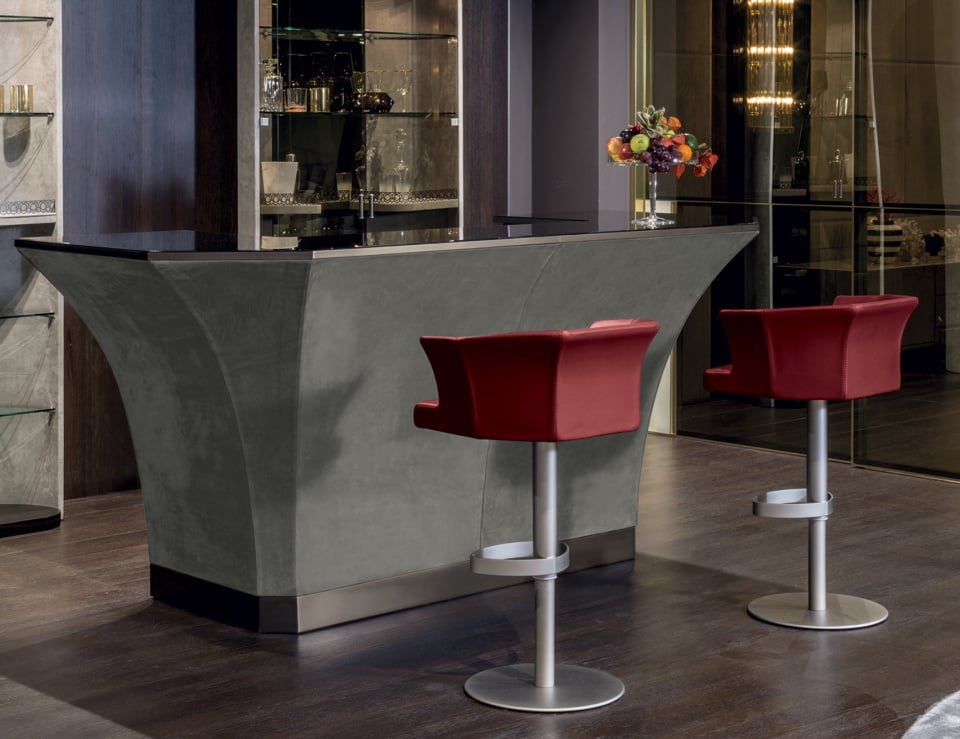 Modern bar setup with red stools