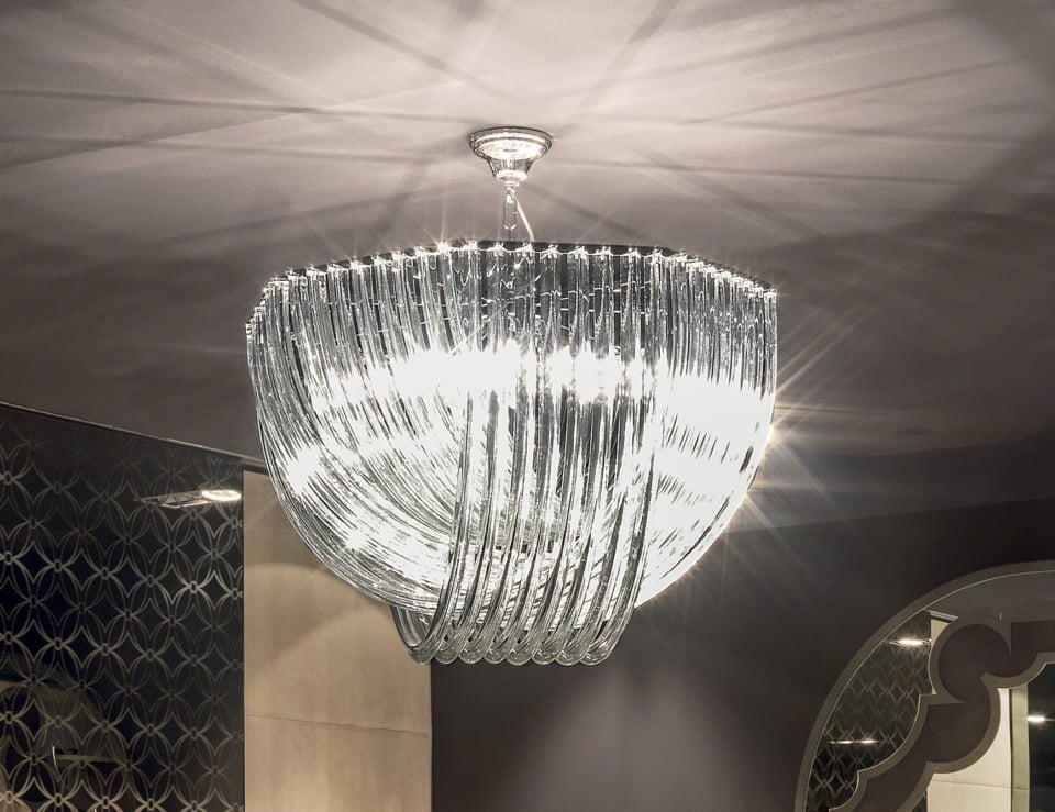 Elegant glass chandelier with reflections