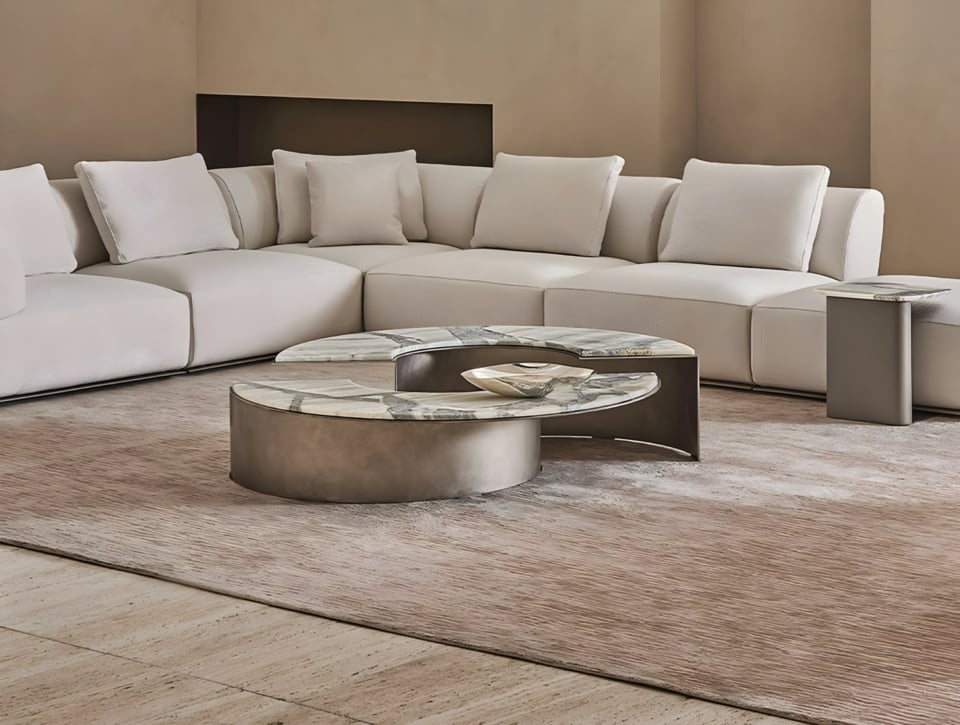 Modern curved sectional sofa with marble coffee table