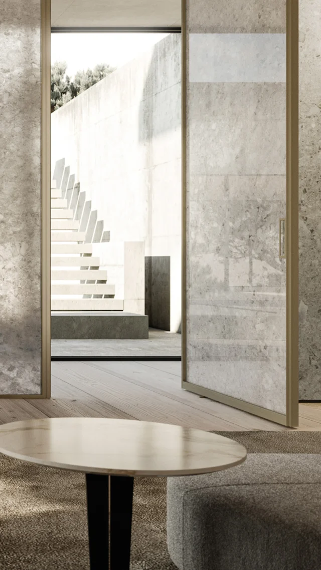 CUSTOM DOORS
Introducing Manhattan custom Italian wall system shown in Ceppo di Gré. Shown with a fixed centered panel and side Manhattan pivot doors. The panels are shown with square handles, and the cube frame is shown in a satin brass finish. Metal finish options: black, white, aluminum, titanium, moka and brass. This collection faithfully returns the elegance of this stone, transforming it, through glass and light, into something truly unique for all types of doors and fixed glass panels. This collection can be adapted to create sophisticated atmospheres, both for the living and bedroom areas. Manhattan is available as a 180-door, swing door, disappearing sliding door, outside sliding door, or wall system. Finishes and profiles are available in various options upon request. Made in Italy.
#nellavetrina #livingroomdesign #livingroomdecoration #livingroominspiration #luxurylivingroom #livingroomgoals #italianfurniture #fireplace #pool #wallunit #bar #bookcase #customfurniture #italiandesign #interiordesign #decoration #interiordecor #modernfurniture #customdesign #contemporaryfurniture #homedecor #italianinterior #custommade #architecture #interiordesigner #luxuryfurniture #luxuryliving #italianliving #luxurydesigns